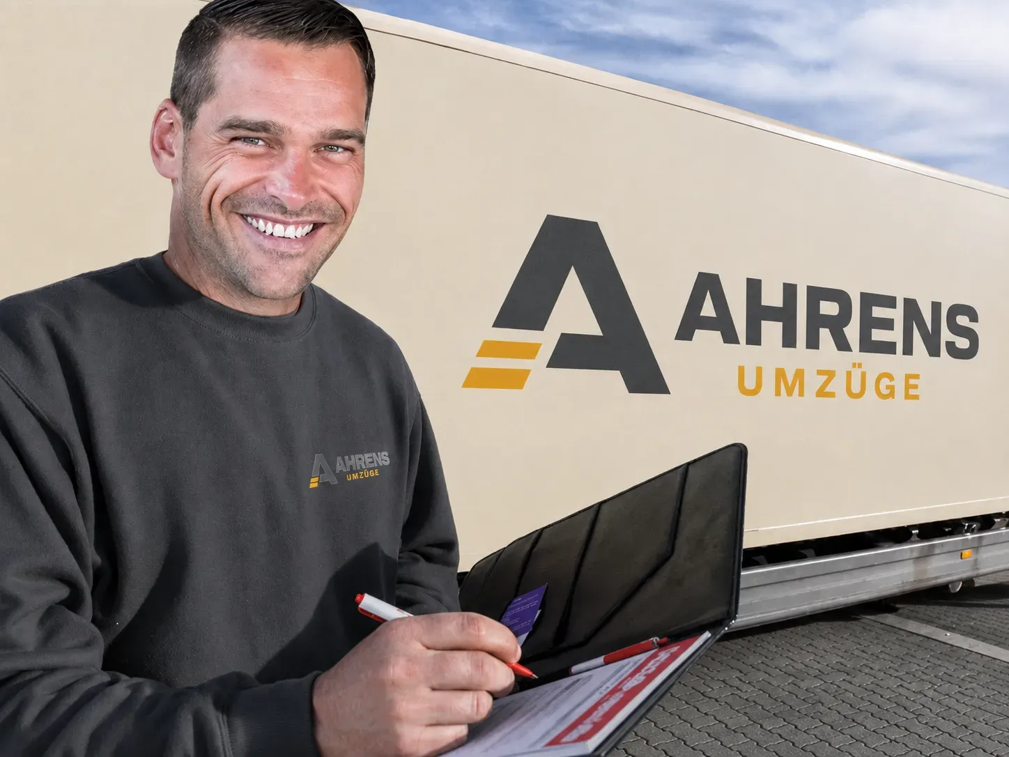 Ansprechperson vor einem Umzugsfahrzeug – Symbolbild